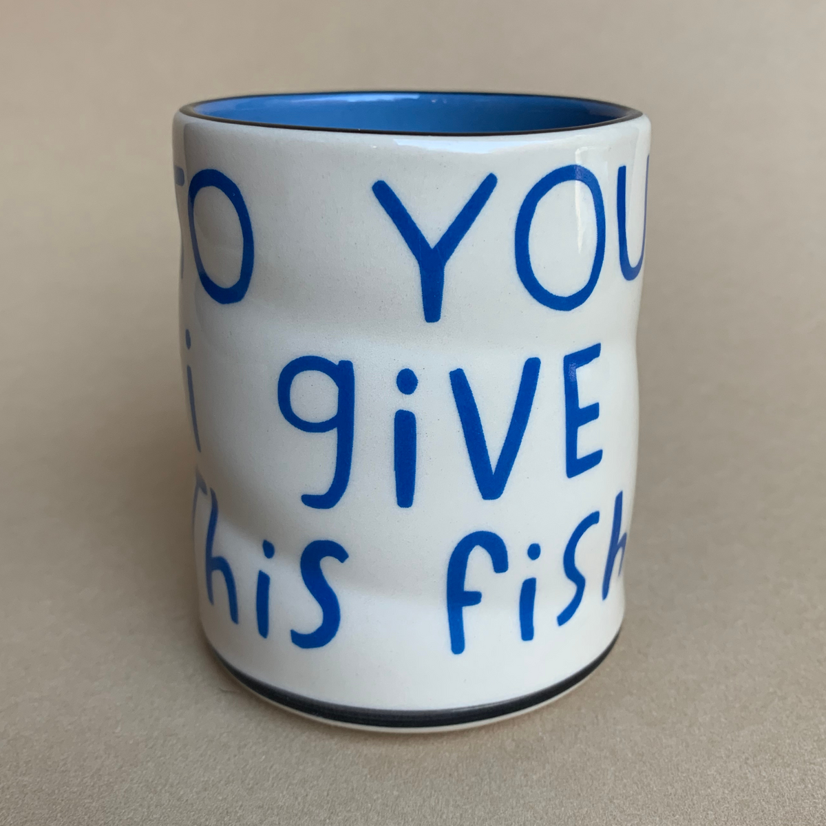This Fish Spark Cup by The Bowl Maker - Ceramic Coffee Tea Mug - Back
